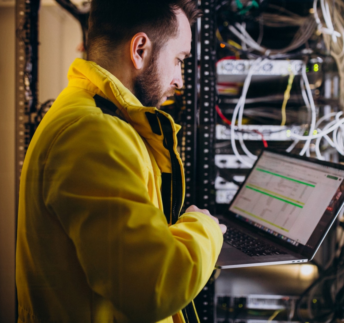 Young man engineer making program analyses